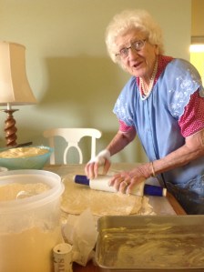 Grandma making cinnamon rolls